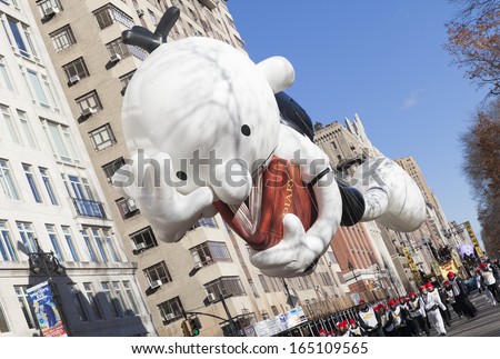 NEW YORK - NOVEMBER 28: Diary of Wimpy Kid balloon is flown low because of weather condition at the 87th Annual Macy's Thanksgiving Day Parade on November 28, 2013 in New York City.