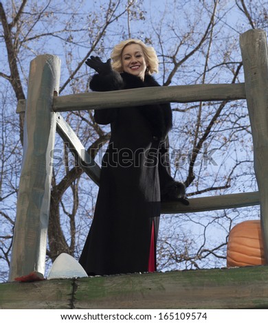 NEW YORK - NOVEMBER 28: Kellie Pickler rides the float at the 87th Annual Macy\'s Thanksgiving Day Parade on November 28, 2013 in New York City.