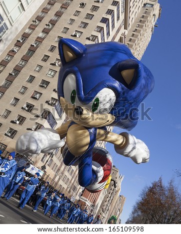NEW YORK - NOVEMBER 28: Sonic the Hedgehog balloon is flown low because of weather condition at the 87th Annual Macy\'s Thanksgiving Day Parade on November 28, 2013 in New York City.