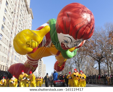 NEW YORK - NOVEMBER 28: Ronald McDonalds balloon is flown low because of weather condition at the 87th Annual Macy\'s Thanksgiving Day Parade on November 28, 2013 in New York City.