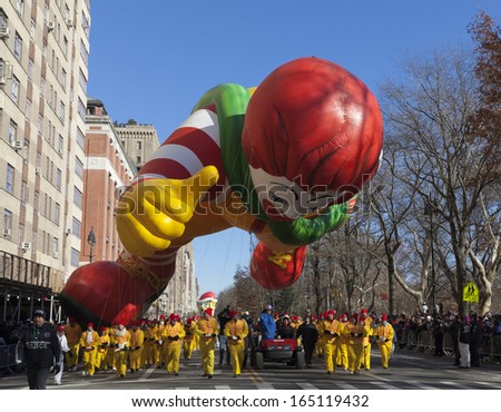 NEW YORK - NOVEMBER 28: Ronald McDonalds balloon is flown low because of weather condition at the 87th Annual Macy\'s Thanksgiving Day Parade on November 28, 2013 in New York City.