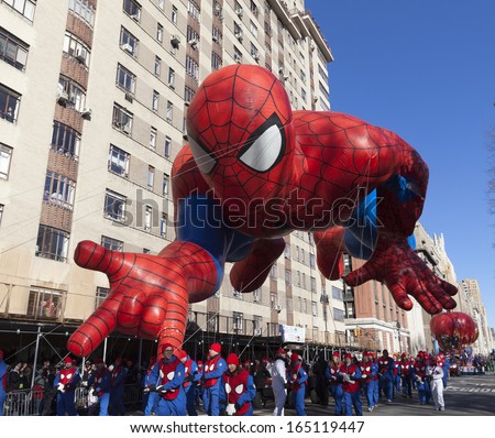 NEW YORK - NOVEMBER 28: Spiderman balloon is flown low because of weather condition at the 87th Annual Macy\'s Thanksgiving Day Parade on November 28, 2013 in New York City.