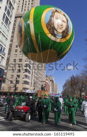 NEW YORK - NOVEMBER 28: Wizard of Oz balloon is flown low because of weather condition at the 87th Annual Macy\'s Thanksgiving Day Parade on November 28, 2013 in New York City.