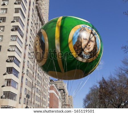 NEW YORK - NOVEMBER 28: Wizard of Oz balloon is flown low because of weather condition at the 87th Annual Macy\'s Thanksgiving Day Parade on November 28, 2013 in New York City.