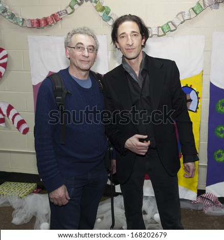 NEW YORK - DEC 20: Adrien Brody & Lev Radin attend Action Center Post-Sandy Holiday Party at The Action Center presented by Bulgari & Save the Children on Dec 20, 2013 in Far Rockaway of Queens in NYC