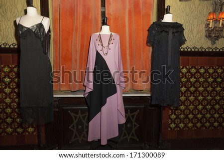 NEW YORK, NY - JANUARY 13, 2014: Vintage dress by Jason Wu, Narciso Rodriguez and Marc Jacobs (L-R) on display at the Vintage Vanguard event benefiting Dress For Success at Jane Hotel in New York City