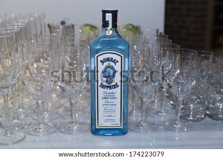 NEW YORK, NY - JANUARY 30, 2014: Bombay Sapphire gin bottle at The Luxury collection hotels & resorts exhibition VISUAL JOURNEY PERU by Helena Christensen to benefit Oxfam at Bleecker Street Arts Club
