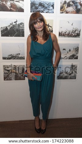 NEW YORK, NY - JANUARY 30, 2014: Helena Christensen attends Luxury collection hotels & resorts exhibition \'VISUAL JOURNEY PERU\' by Helena Christensen to benefit Oxfam at Bleecker Street Arts Club