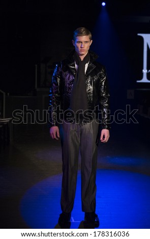 NEW YORK, NY - FEBRUARY 11, 2014: Model walks runway for Dinner with Edward presentation by Malan Breton at Fall/Winter 2014 Fashion week at 510 West 42nd street