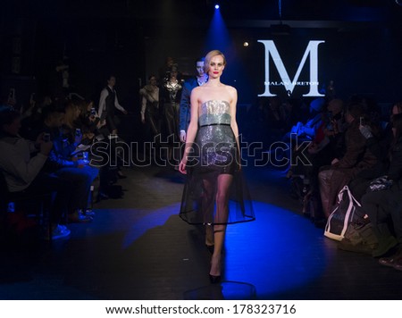 NEW YORK, NY - FEBRUARY 11, 2014: Models walk runway for Dinner with Edward presentation by Malan Breton at Fall/Winter 2014 Fashion week at 510 West 42nd street