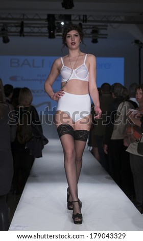 NEW YORK, NY - FEBRUARY 24, 2014: Model walks runway for Lingerie fashion night IN show by Hanes brands during CurveExpo at Tribeca Skyline Studios