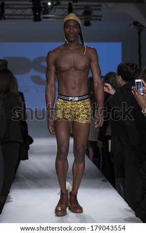 NEW YORK, NY - FEBRUARY 24, 2014: Model walks runway for Lingerie fashion night IN show by PSD Underwear during CurveExpo at Tribeca Skyline Studios