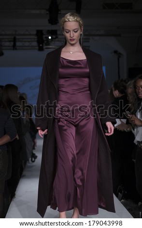 NEW YORK, NY - FEBRUARY 24, 2014: Model walks runway for Lingerie fashion night IN show by Maison de Papillon during CurveExpo at Tribeca Skyline Studios