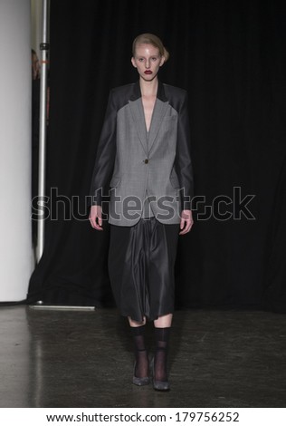NEW YORK, NY - FEBRUARY 08, 2014: Model shows off dress for Charles Harbison at New York Fall/Winter 2014 Fashion week at Milk Studio