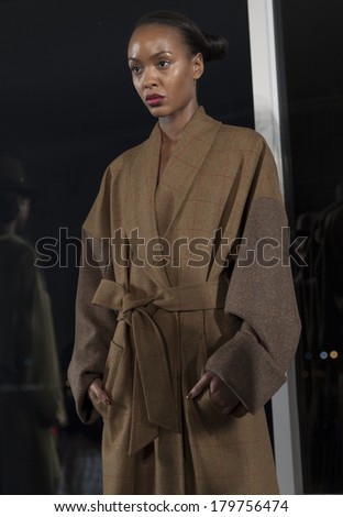 NEW YORK, NY - FEBRUARY 08, 2014: Model shows off dress for Charles Harbison at New York Fall/Winter 2014 Fashion week at Milk Studio
