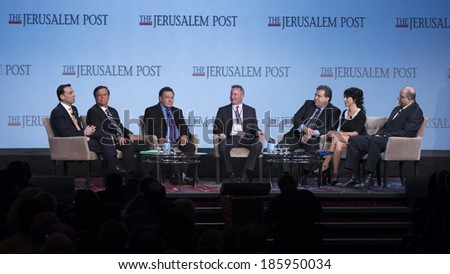 NEW YORK, NY - APRIL 06, 2014: Panel discussion at Jerusalem Post Annual Conference with editor Steve Linde (C) & Israeli singer Rita (2nd R) in Marriott Marquis Times Square