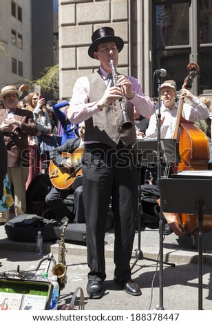 New York, USA - April 20, 2014: Musicians perform at the Easter Bonnet Parade on 5th Avenue