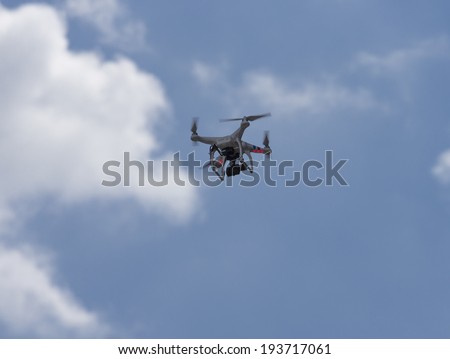 New York, NY USA - May 17, 2014: Phantom drone flying above 8th annual dance parade on Broadway