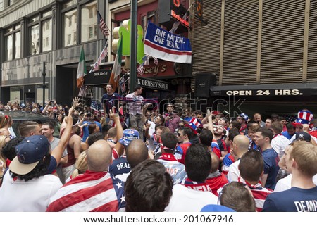 New York, NY USA - JUNE 26: Fans of the United States Men\'s National Soccer Team celebrate after United States advanced to second round of World Cup outside of Jack Demsey\'s Bar