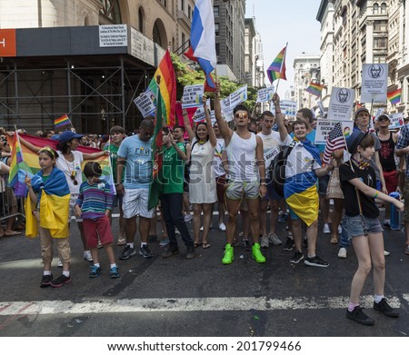 New York, NY USA - June 30, 2014: Protesters against anti-gay policies of Russian government during annual 43rd Pride Parade on Fifth Avenue in Manhattan