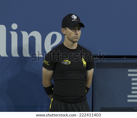 NEW YORK, NY - SEPTEMBER 2, 2014: Ballboy wears biometric Ralph Lauren shirt with OMSignal sensor at4 th round match between Roger Federer & Bautista Agut at US Open in Flushing Meadows