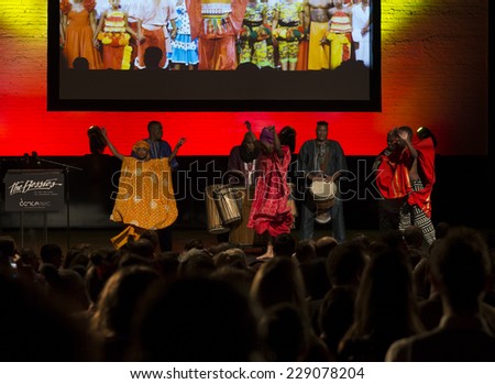 New York, NY - October 20, 2014: Members of African American Dance Ensemble and Dr. Chuck Davis perform on stage during the 2014 Bessies Awards at The Apollo Theater