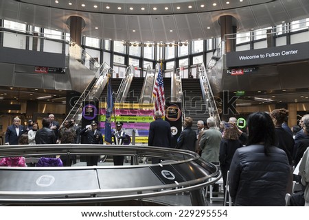 New York, NY - November 9, 2014: Atmosphere during National Anthem sang at opening ceremony of Fulton Center unveiled by Metropolitan Transit Authority during opening ceremony on Broadway in Manhattan