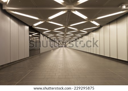 New York, NY - November 9, 2014: Interior design of pedestrian tunnel connecting R subway line & Fulton Center unveiled by Metropolitan Transit Authority during opening ceremony on Broadway, Manhattan