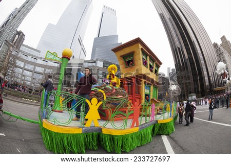 New York, NY USA - November 27, 2014: Cast of Sesame Street rides float at the 88th Annual Macy\'s Thanksgiving Day Parade along Columbus Circle