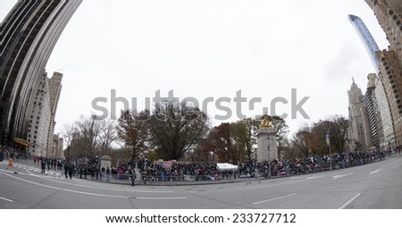 New York, NY USA - November 27, 2014: Crowd watching the 88th Annual Macy\'s Thanksgiving Day Parade along Columbus Circle and from balconies of surrounding buildings