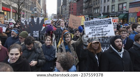 New York, NY USA - December 13, 2014: Protesters march against police brutality and grand jury decision on Eric Garner case on 6th Avenue