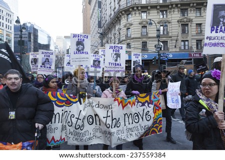 New York, NY USA - December 13, 2014: Protesters march against police brutality and grand jury decision on Eric Garner case on Broadway