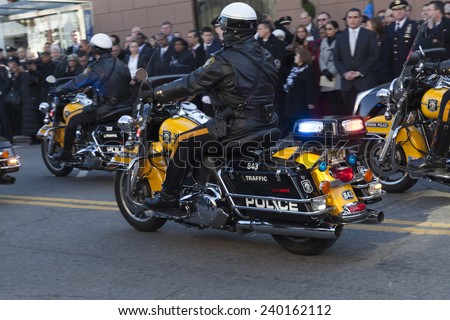 NEW YORK, NY - DECEMBER 27, 2014: Police officer on Motorcycle from Newark attends Christ Tabernacle Church for the funeral of slain New York City Police Officer Rafael Ramos