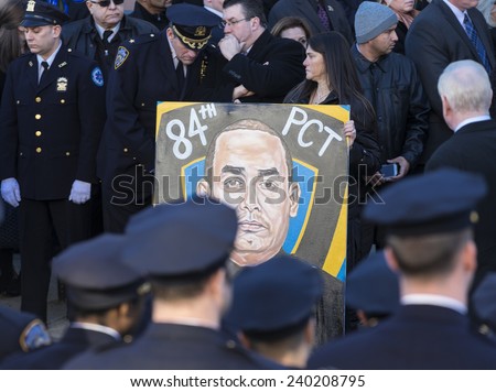 NEW YORK, NY - DECEMBER 27, 2014: Police officers from around the country gather outside of Christ Tabernacle Church for the funeral of slain New York City Police Officer Rafael Ramos