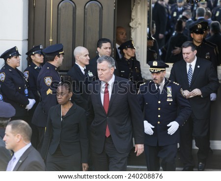 NEW YORK, NY - DECEMBER 27, 2014: NYC mayor Bill De Blasio & Chirlane McCray attend Christ Tabernacle Church for the funeral of slain New York City Police Officer Rafael Ramos