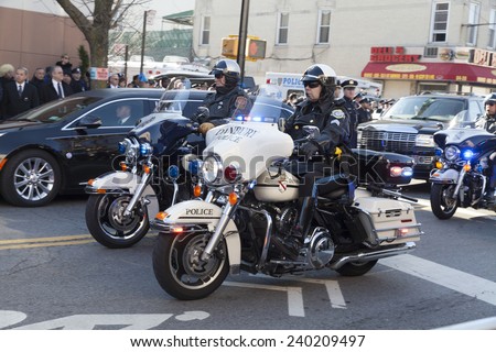 NEW YORK, NY - DECEMBER 27, 2014: Police officer on Motorcycle from Danbury attends Christ Tabernacle Church for the funeral of slain New York City Police Officer Rafael Ramos