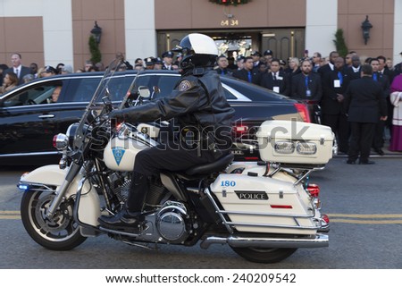 NEW YORK, NY - DECEMBER 27, 2014: Police officer on Motorcycle from New Haven attends Christ Tabernacle Church for the funeral of slain New York City Police Officer Rafael Ramos