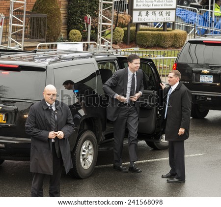 Brooklyn, NY - January 04, 2015: FBI Director James Comey attends ceremony at Aievoli Funeral Home for the funeral of slain New York City Police Officer Wenjian Liu