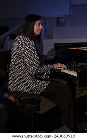 New York, NY - January 08, 2015: Renee Rosnes plays as part of Ron Carter trio at Jazz Legends for Disability Pride concert at Quaker Friends Meeting House in Manhattan