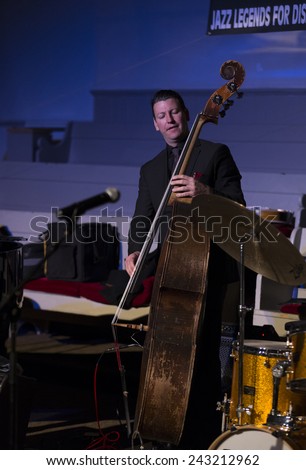 New York, NY - January 08, 2015: John Webber plays as part of Jimmy Cobb Mob quartet at Jazz Legends for Disability Pride concert at Quaker Friends Meeting House in Manhattan