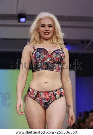 New York, NY - February 23, 2015: Gia Genevieve March Playboy cover girl walks runway for Panache during Lingerie Fashion Night of CURVEXPO in Studio 05