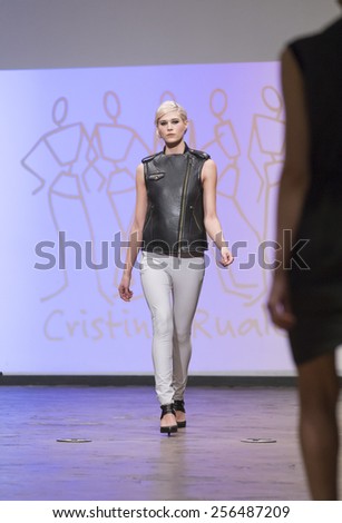 New York, NY - February 17, 2015: Model walks runway for Christina Ruales ready to wear collection during Fall 2015 Fashion Week in Stollway NYC