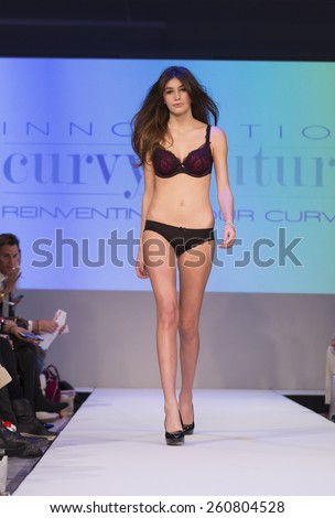 New York, NY - February 23, 2015: Model walks runway at Lingerie Fashion Night for Curvy Couture design as part of Curvexpo New York in Studio 05