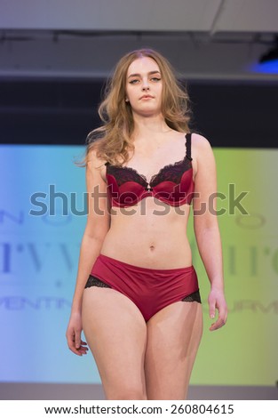 New York, NY - February 23, 2015: Model walks runway at Lingerie Fashion Night for Curvy Couture design as part of Curvexpo New York in Studio 05