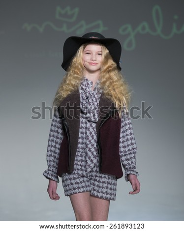 New York, NY - February 28, 2015: A model walks the runway for Little Miss Galia collection by Alia Charvel during petitePARADE / Kids Fashion Week at Bathhouse Studios