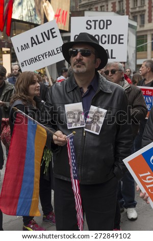 New York, NY - April 26, 2015: Thousands rally in Manhattan Times Square to mark centennial of the deaths of 1.5 million Armenians under the Ottoman Empire in 1915