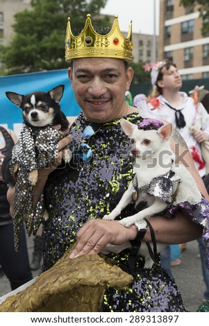 New York, NY USA - June 20, 2015: Designer Anthony Rubio with his dogs attends 33rd Mermaid parade on Coney Island in Brooklyn