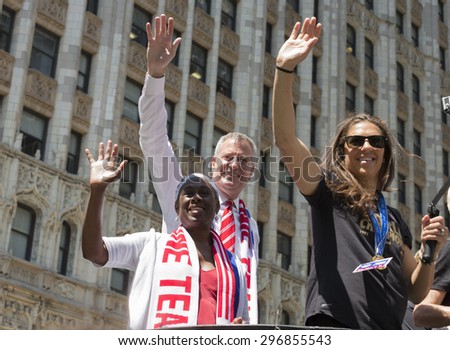 New York, NY USA - July 10, 2015: Carli Lloyd, Bill de Blasio  attend New York City Ticker Tape Parade For World Cup Champions U.S. Women Soccer National Team on Broadway
