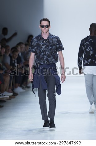 New York, NY USA - July 14, 2015: Model walks runway for Ovadia & SOns show during Mens fashion week S/S 2016 at Skylight Clarkson Square