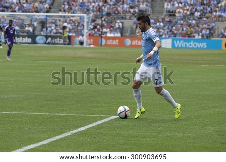 New York, NY - July 26, 2015: David Villa (7) controls ball during game between New York City Football Club and Orlando City SC at Yankee Stadium